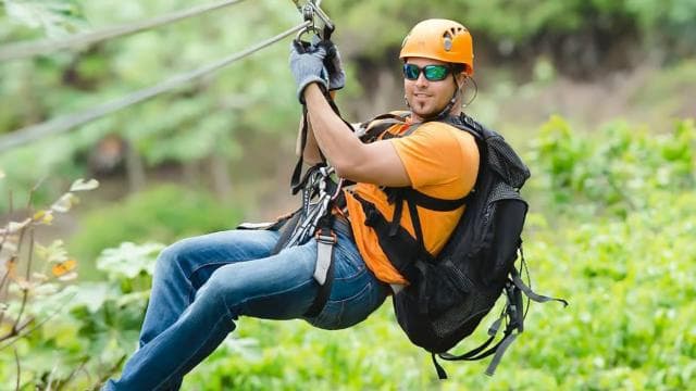 From San Juan: Zipline Canopy Adventure Tour