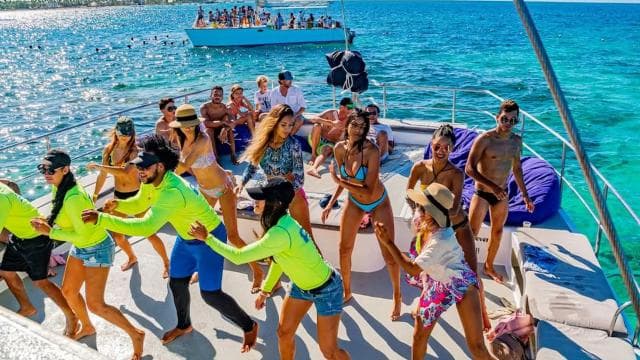 Punta Cana Area: Party Cruise with Parasailing and Open Bar