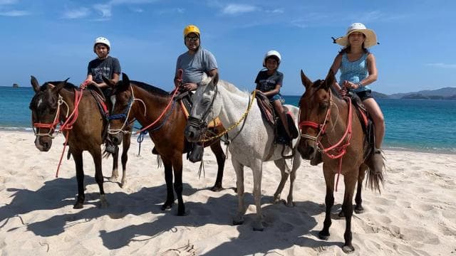 Horseback riding on the beach
