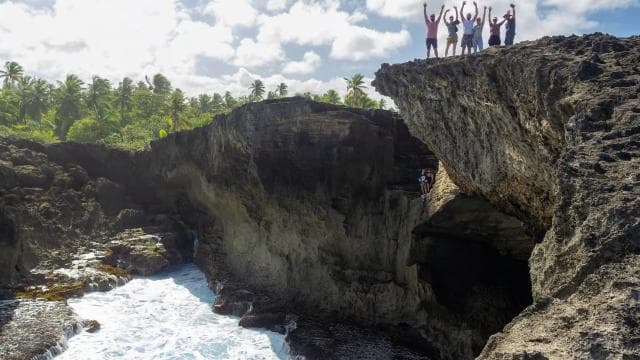 From San Juan: Cave of the Taino Indian Trek and Beach Tour