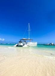 Punta Cana Bavaro: Private catamaran boat with snorkeling, open bar, and sailing